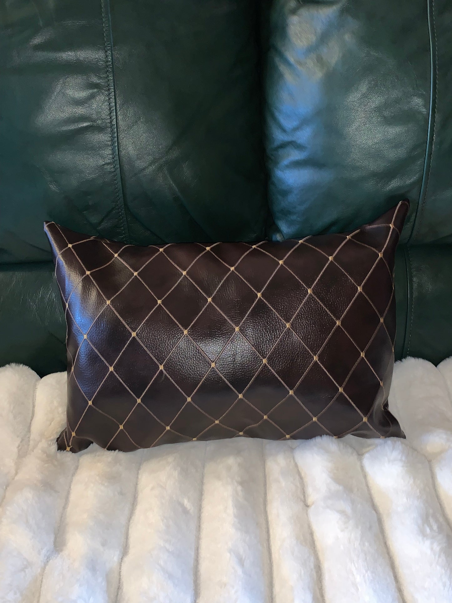 Square faux leather pillow